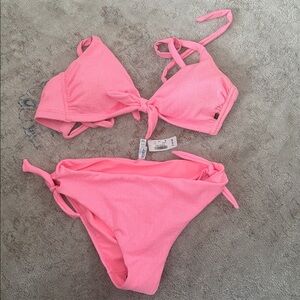 La Vie En Rose Bikini Top C or D cup.  Medium bikini bottom. Adjustable